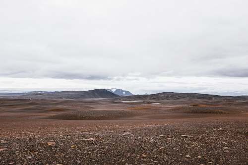 dirt road brown landscape and mountain gravel